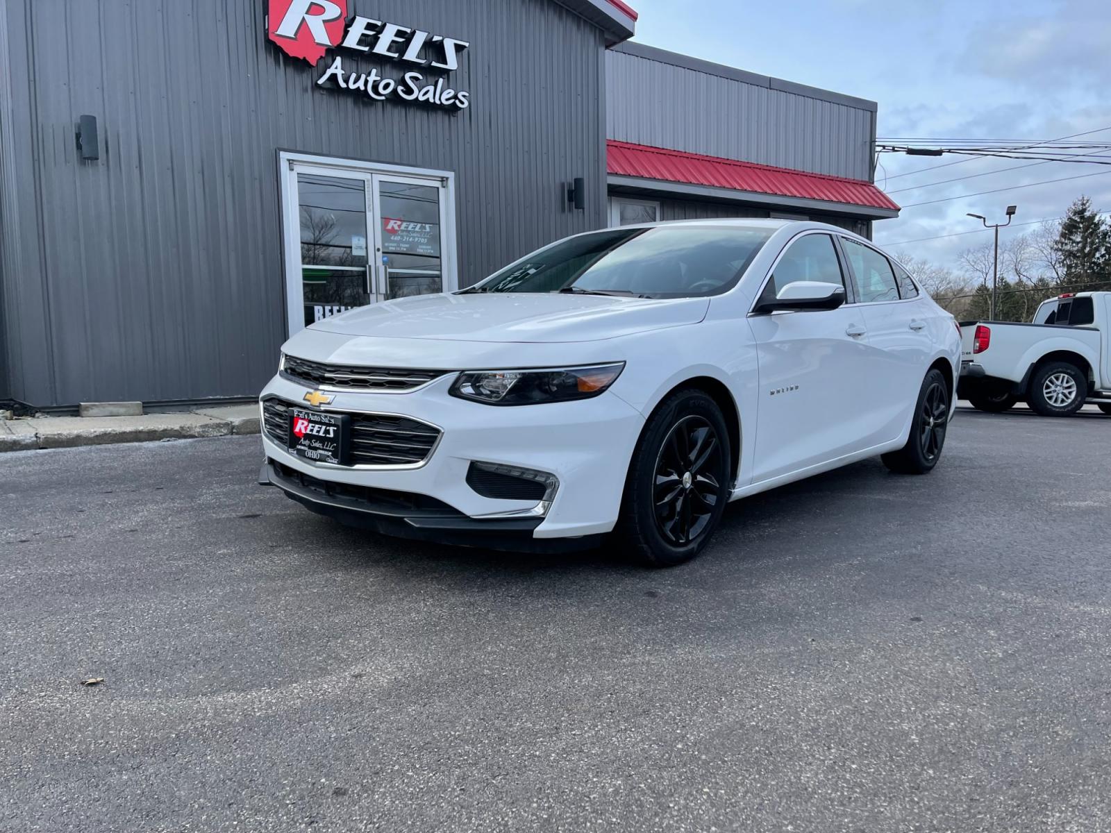2016 White /Black Chevrolet Malibu 1LT (1G1ZE5ST7GF) with an 1.5L I4 DOHC 16V TURBO engine, 6A transmission, located at 11115 Chardon Rd. , Chardon, OH, 44024, (440) 214-9705, 41.580246, -81.241943 - This 2016 Chevrolet Malibu 1LT, is equipped with a 1.5L EcoTec engine and a 6-speed automatic transmission, offers a blend of efficiency and performance. It boasts modern amenities including a backup camera for enhanced safety during reversing, push-button start for convenience, and integrated Apple - Photo #0